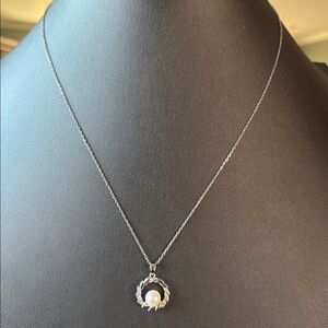 Sterling Silver Necklace Featuring a Freshwater Pearl with swirl design